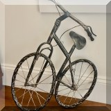 D17. Metal bicyle decoration. 